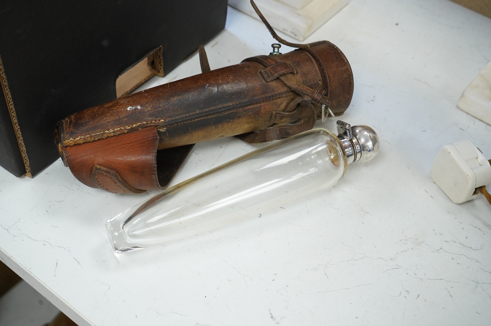 Two leather-cased spirit flasks and graduated set of brass weights